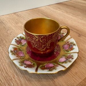 Red and gold tea cup and plate 4.25” diameter